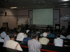 Photo: Akram giving presentation on Danishkadah